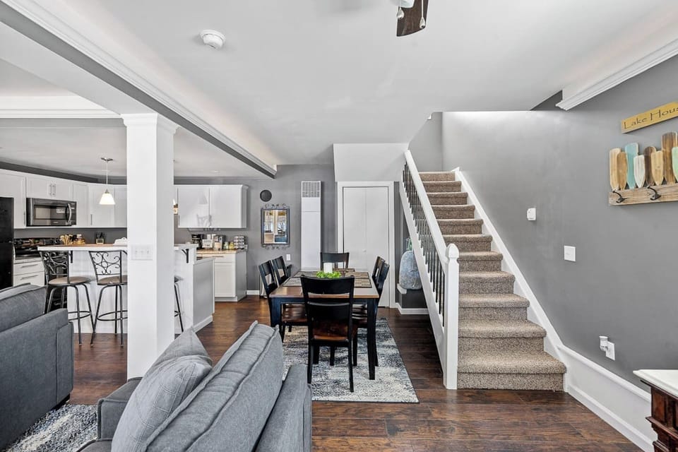 Walk into the first floor open concept main living room, dinning room, and kitchen