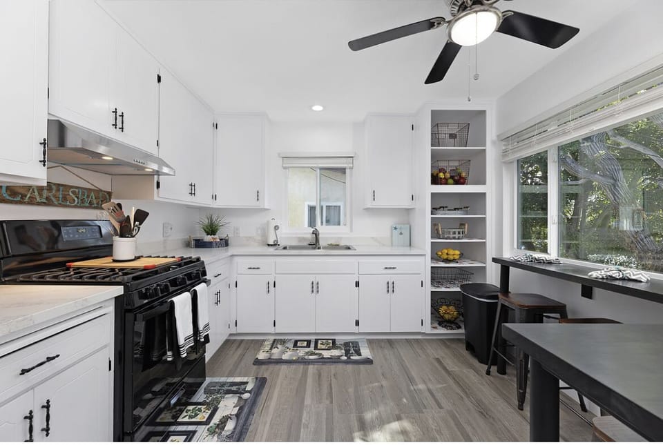 Full service kitchen with appliances, dishes, silverware, everything you need.