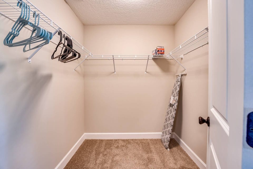 Closet in Owner's Suite - Iron & Ironing Board available for use