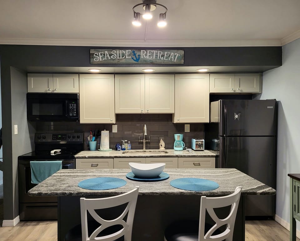 Fully equipped kitchen. Includes many small appliances and spices for meal prep.