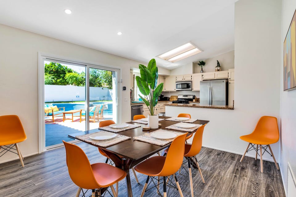 Dining area easily seats 8 people. We have plenty of dishes and utensils for you