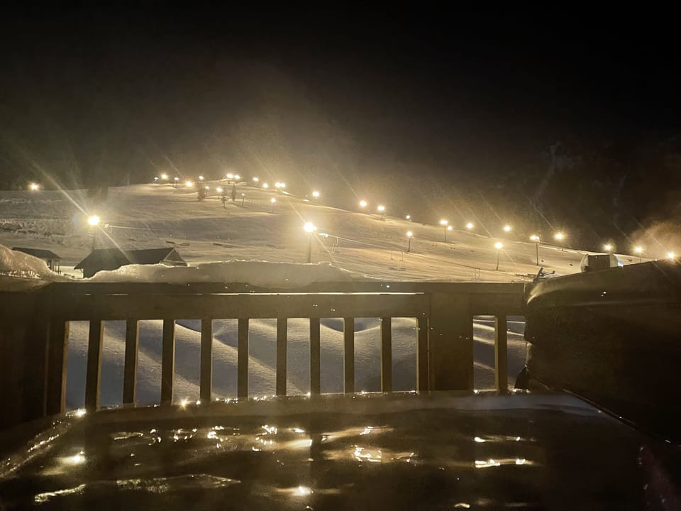 Hot Tub @night w/the lights from night skiing. Once lights are off only stars!