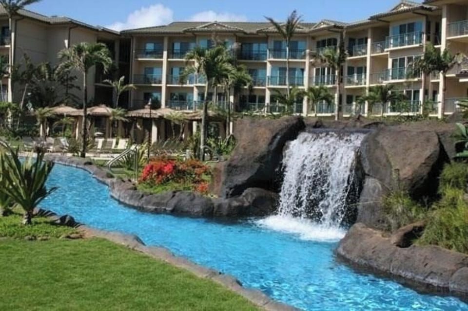 Swim underneath the waterfall into the cove 