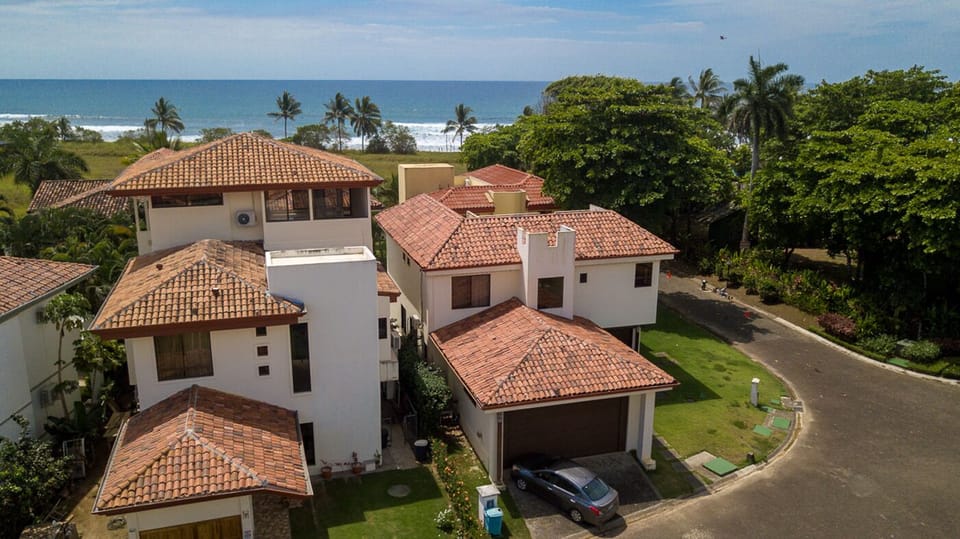 Drone shot of the house and neighborhood. My house is on the left.