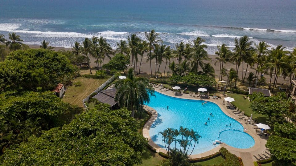 A drone shot of the pool / beach club which is only a minute walk from the house