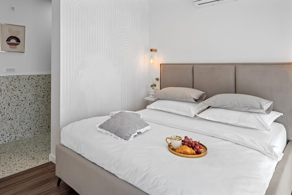 Bedroom No3. with a king size bed and shared balcony