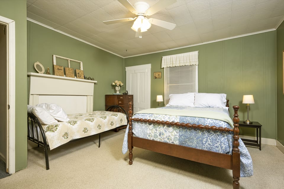 Twin and full bed in 2 bedroom West Virginia 1887 Farm House. 