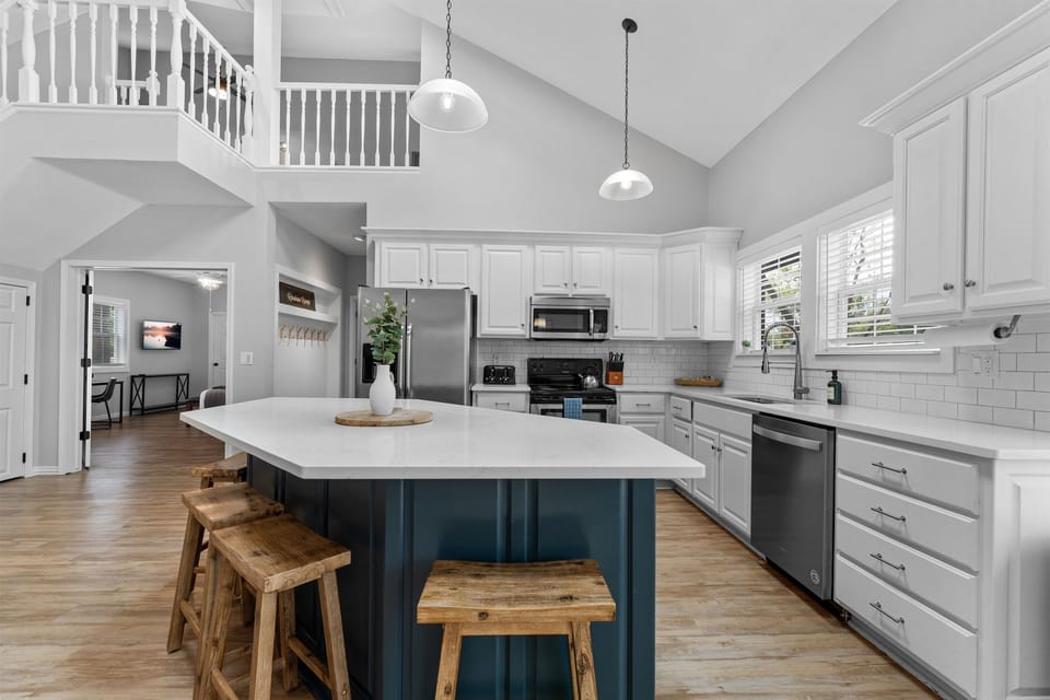 The kitchen is stocked with pots, pans and utensils to prepare big meals for your famliy gatherings