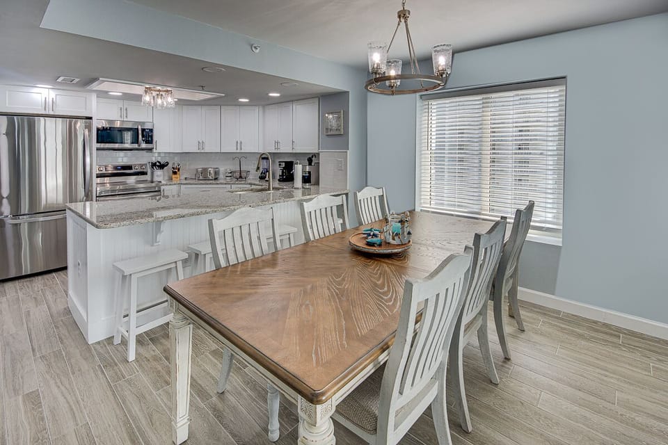 New dining table that seats up to 10 plus bar seating for 4