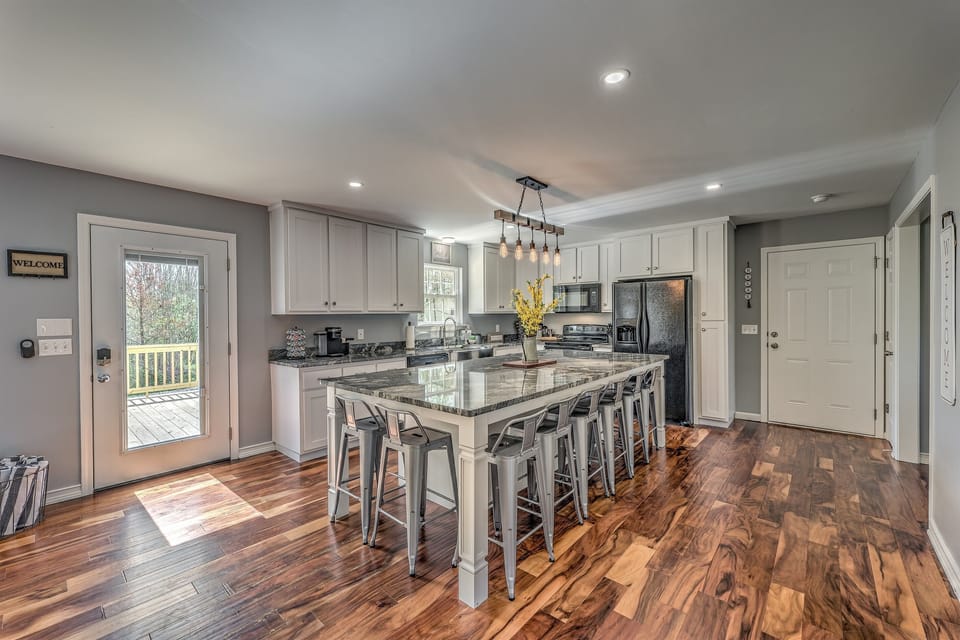 Fully equipped kitchen with tons of appliances and Keurig latte maker. Seating for 8 at the massive island.