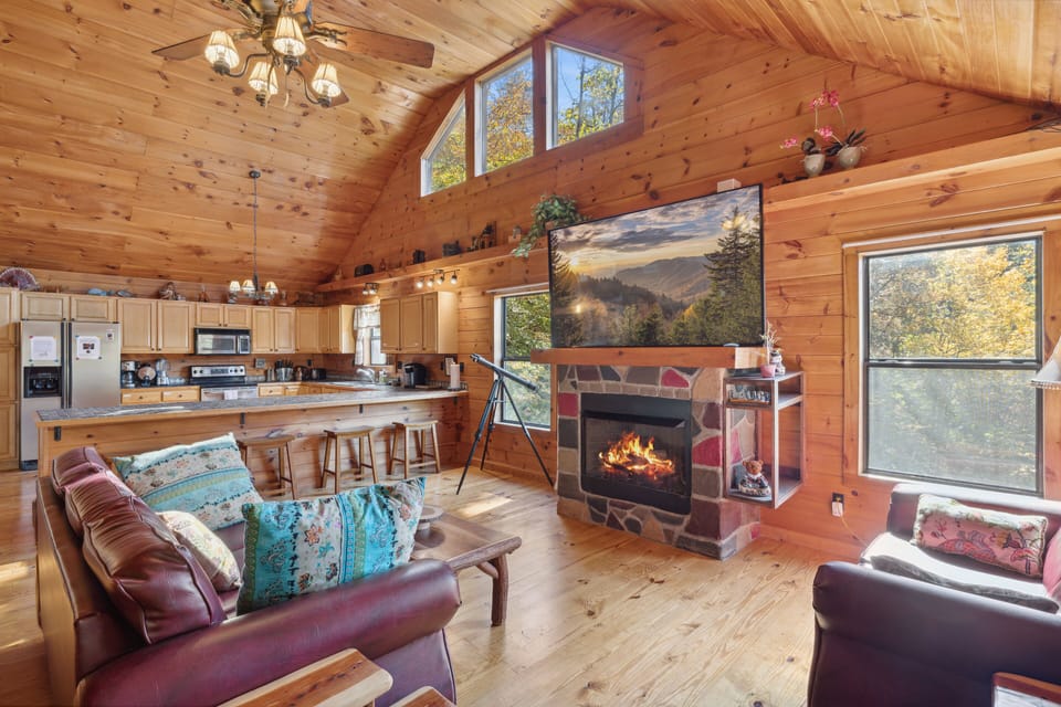 Grand, spacious living room flooded with natural light.