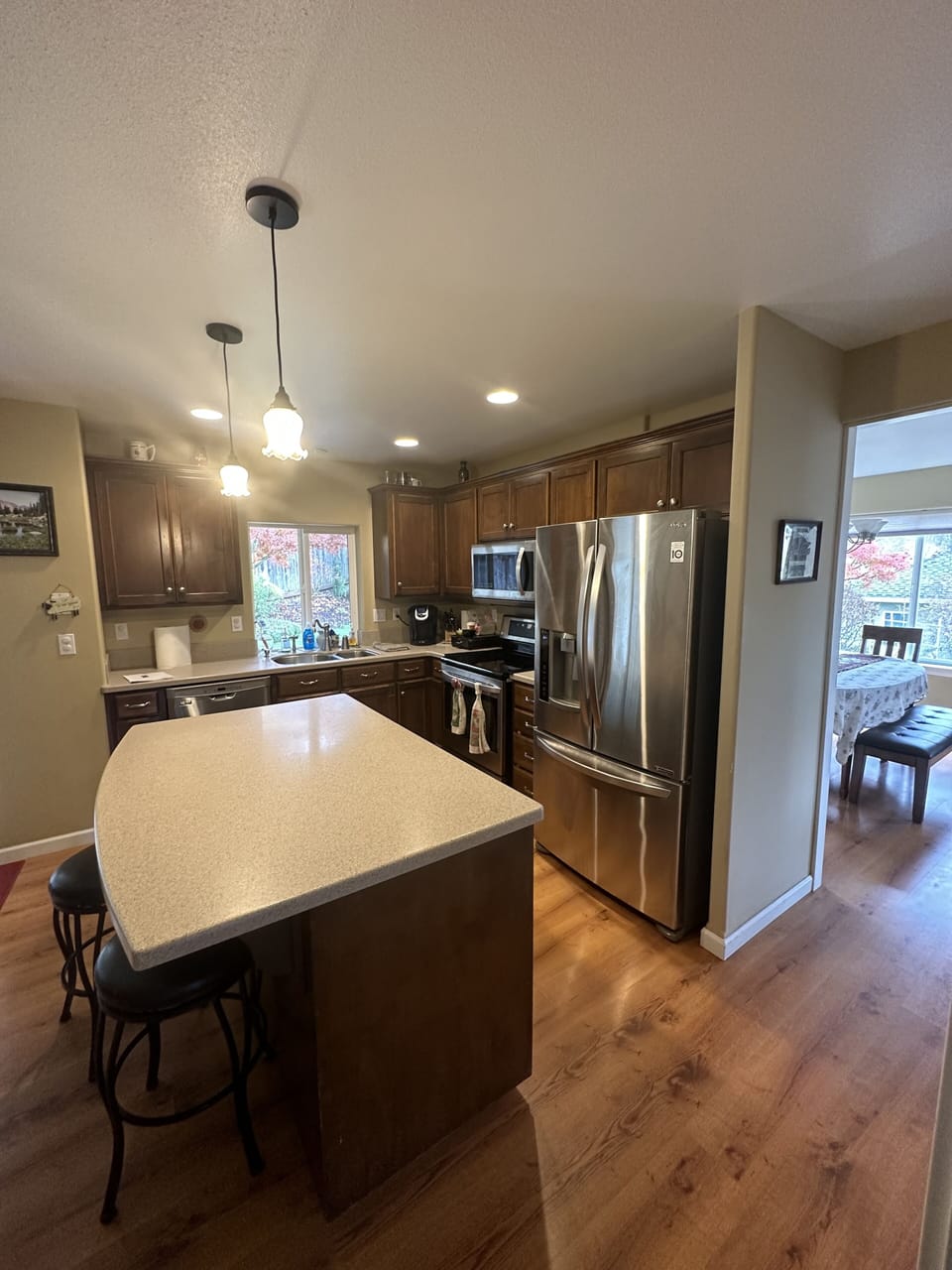Kitchen with stainless steel appliances and large island for gathering