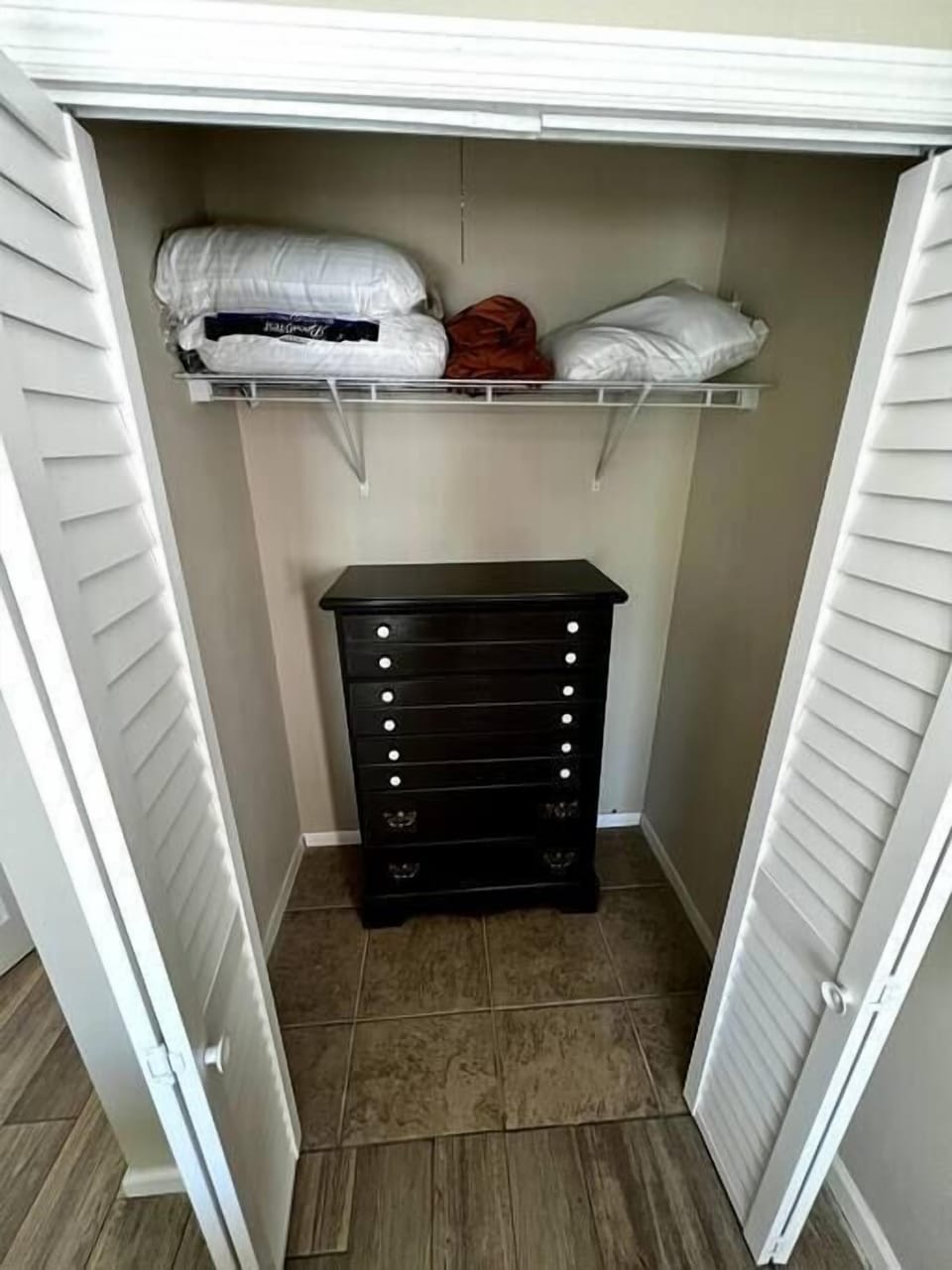 Walk in closet with a dresser, should you need it for longer stays