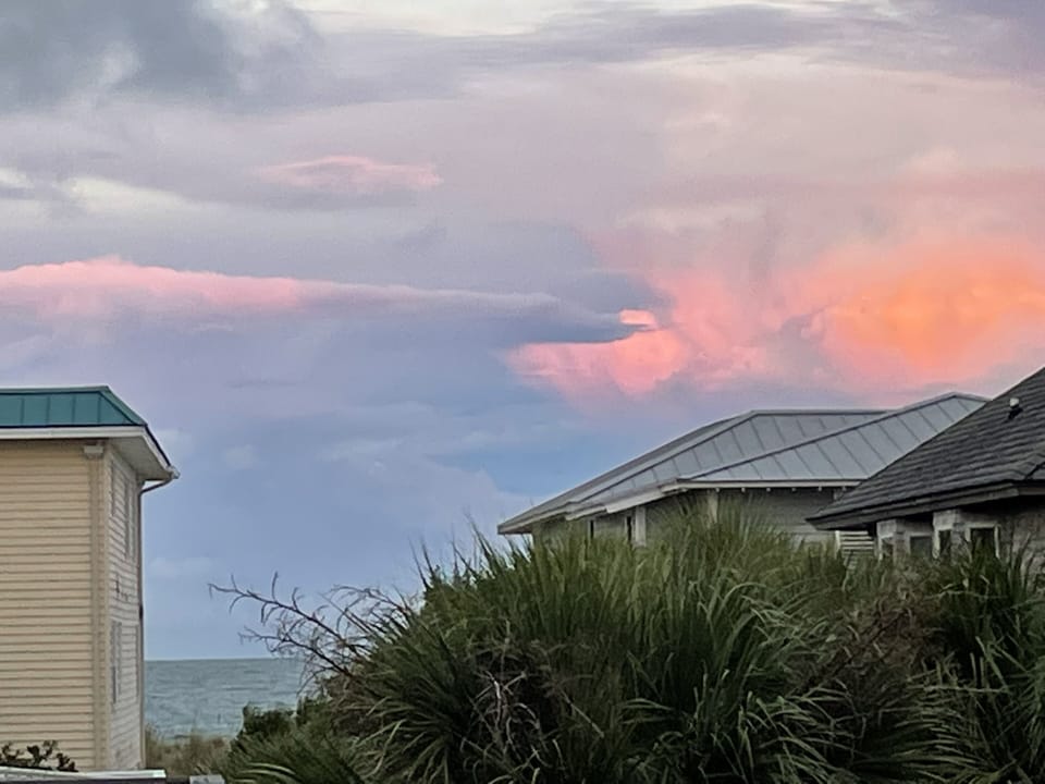 Looking out at the ocean from the upper deck at sunset