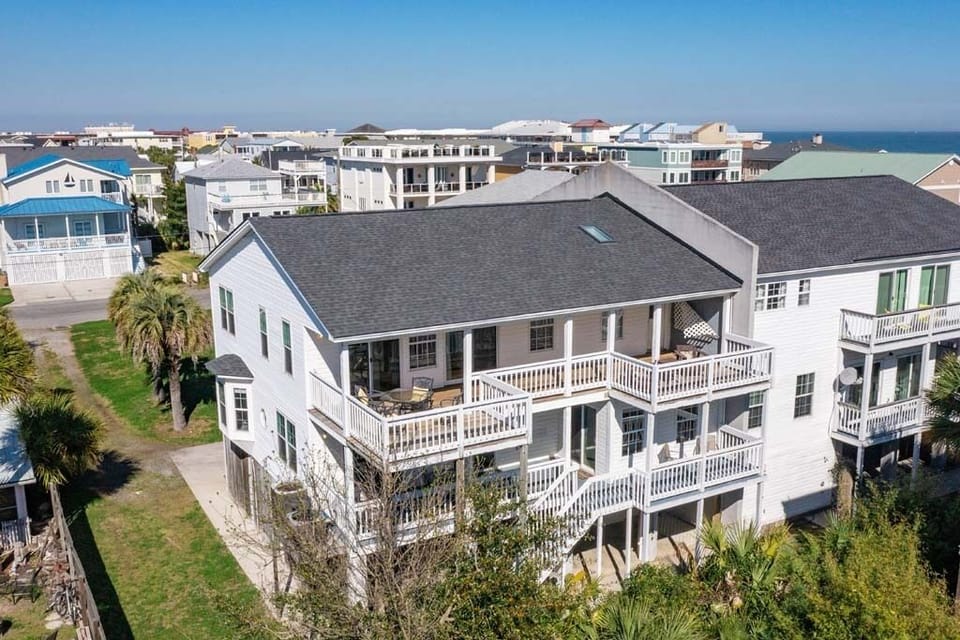 Large Townhome with large verandas catching breezes from east, south, and west.