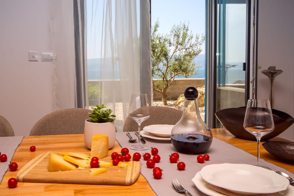 Dining area. Fully equipped kitchen and dining area with exit to outdoor furniture