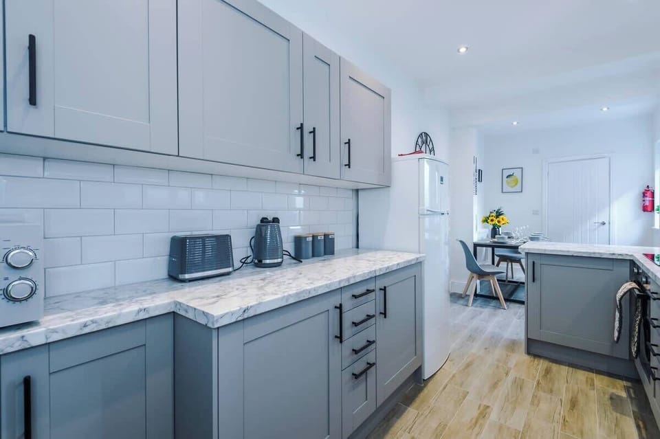 The fully equipped open plan kitchen/dining area has everything you need for a short and long term stay in Crewe. 