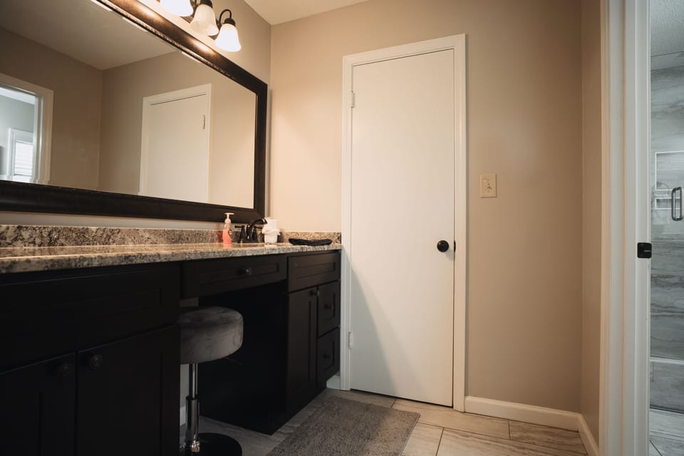 Makeup vanity attached to master bath. 