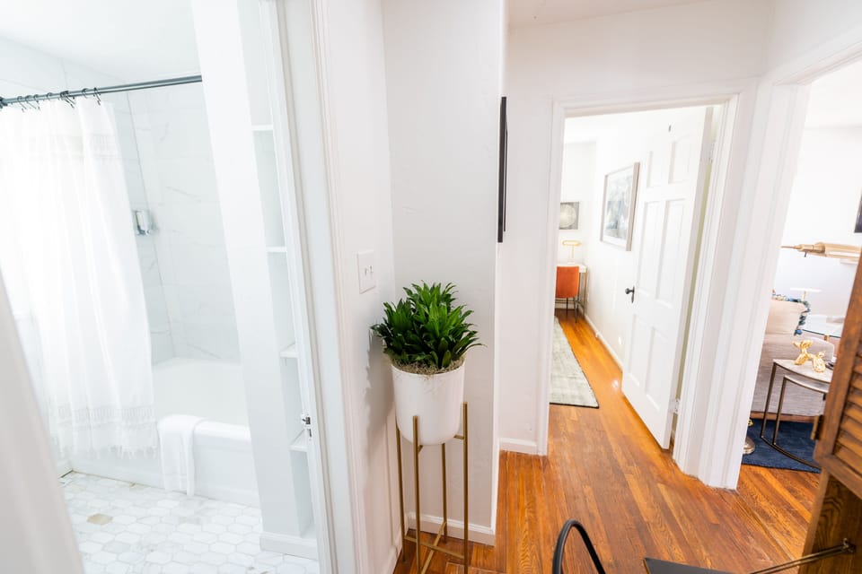 Photo from King Bedroom 2 showing hallway into other king bedroom and bathroom
