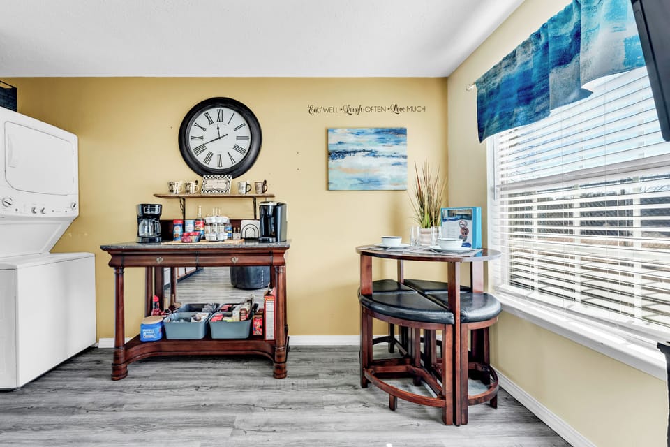 Coffee bar, dining table, and washer/dryer 