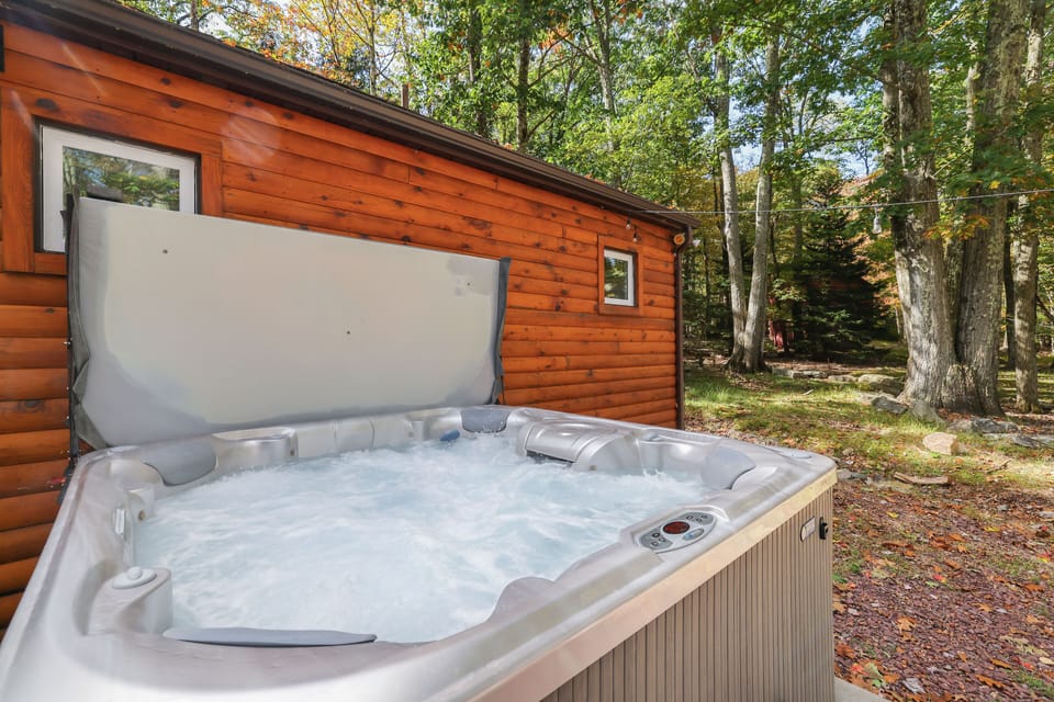 Step outside and relax in the 5person hot tub available year round!