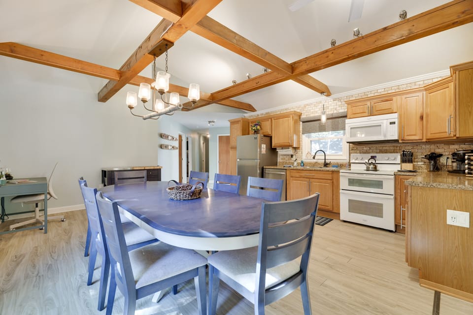 Massive kitchen space- all modern, rolling island and all you need to prep!