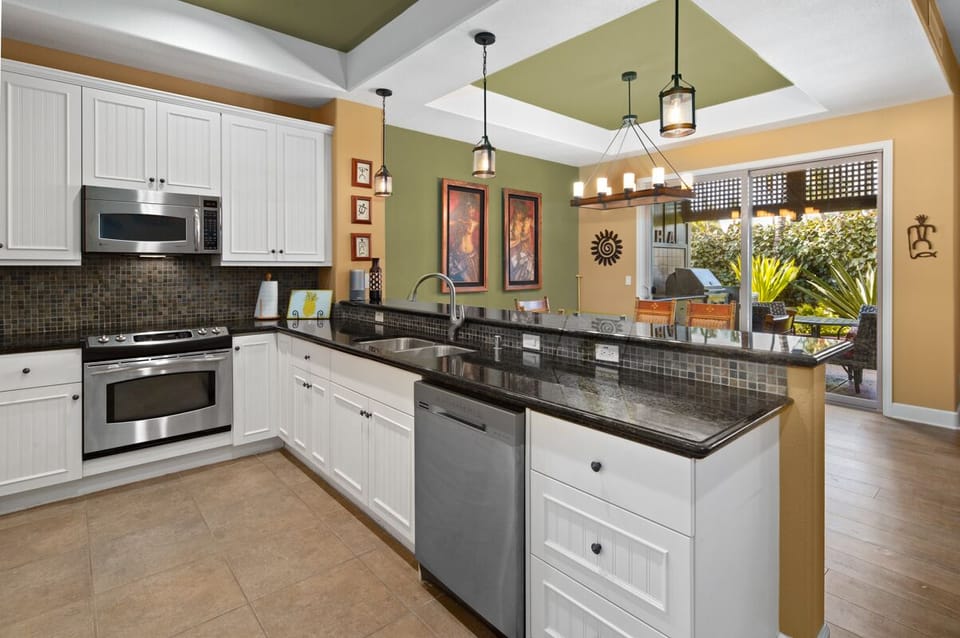 Gourmet kitchen! stocked with a great assortment of spices, oils, with BBQ and cooking essentials