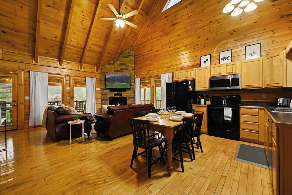 The open floor plan allows quick access to the patio, kitchen and music station.