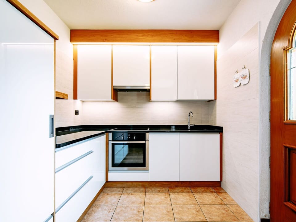 Cabinetry, Countertop, Kitchen Sink, Furniture, Sink, Kitchen Appliance, Kitchen, Kitchen Stove, Wood, Home Appliance