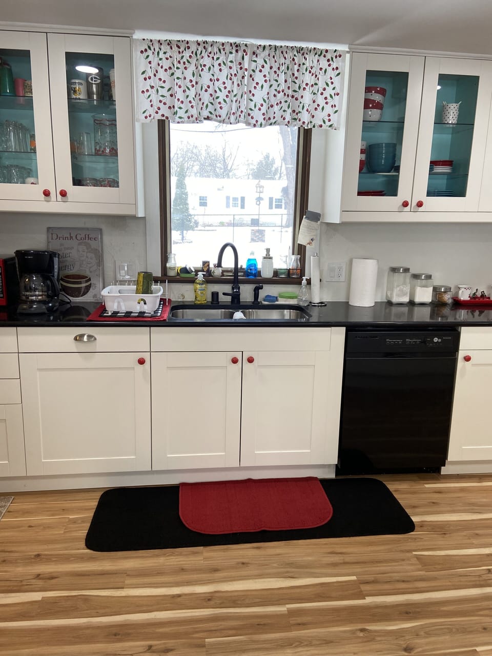 dishwasher. window looking over the patio.