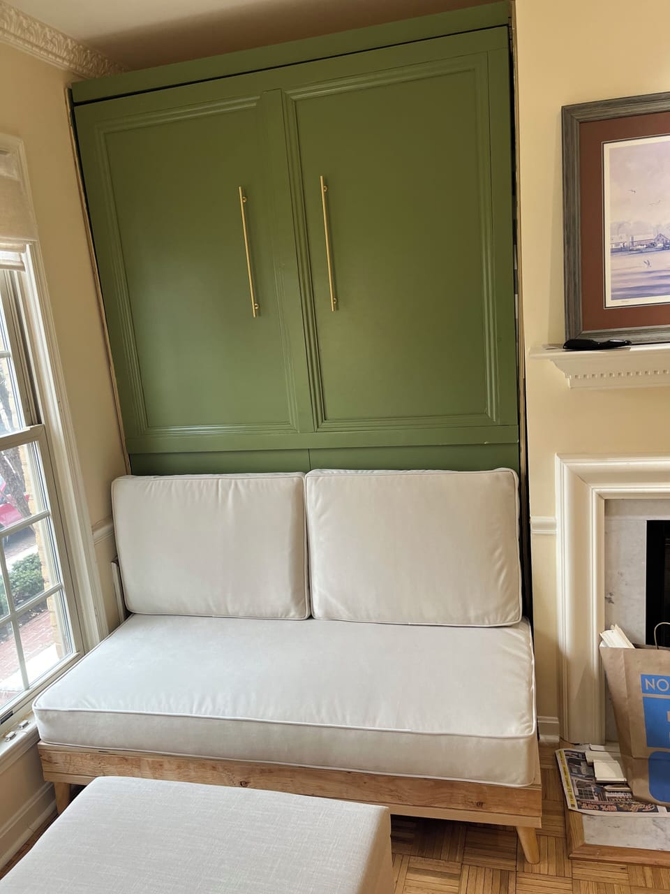 Murphy bed with couch in front. 
Queen mattress bed.