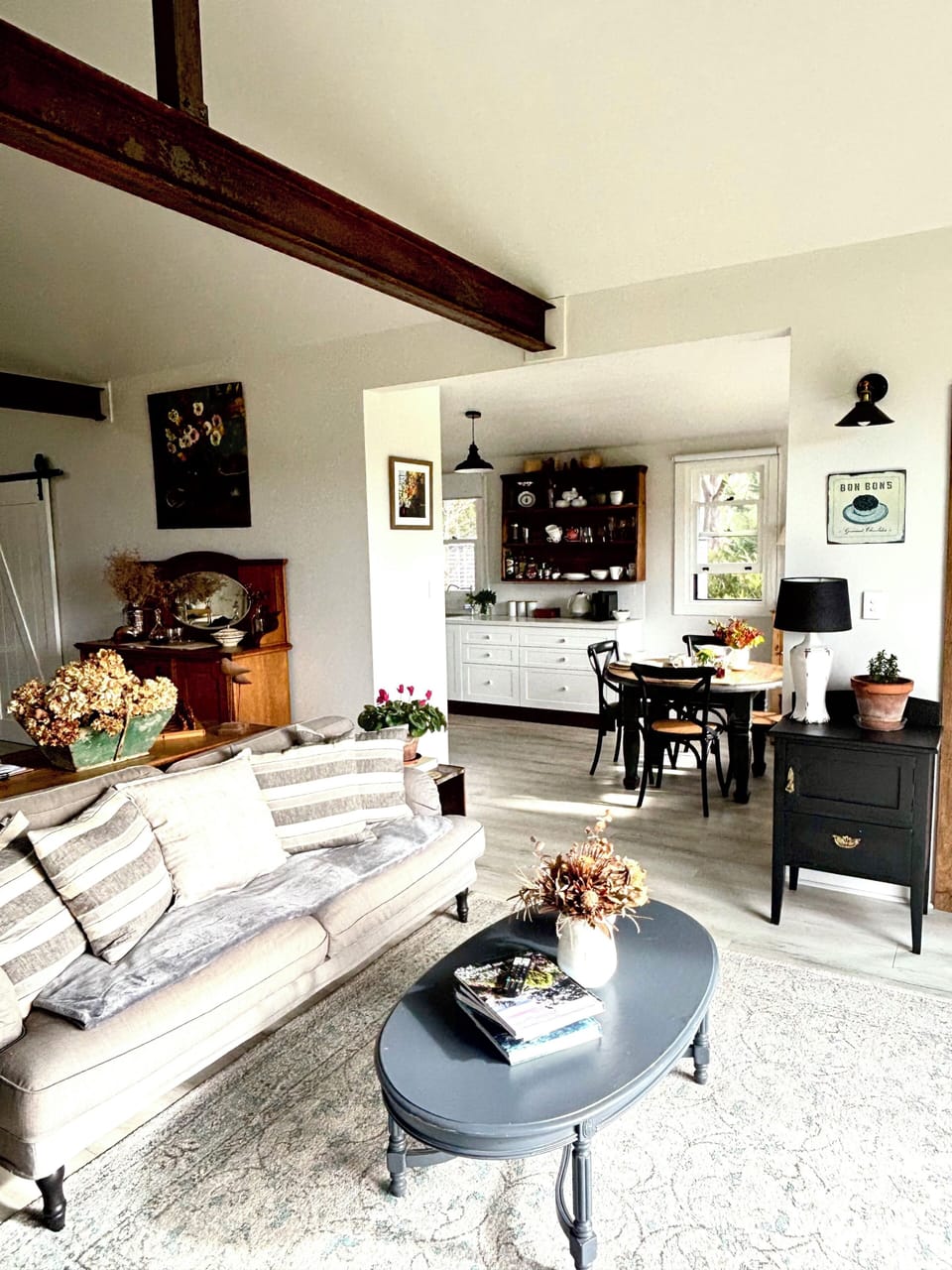 Living room looking into kitchen/dining area