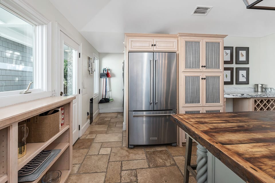 Kitchen leading to laundry area