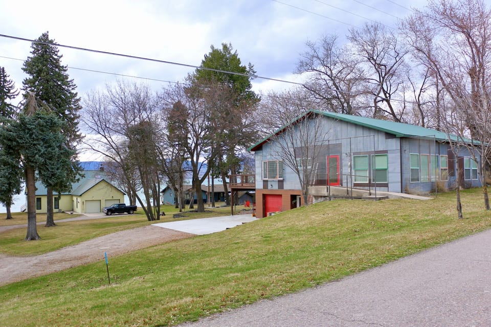 View from the street showing the property location just steps to the lake