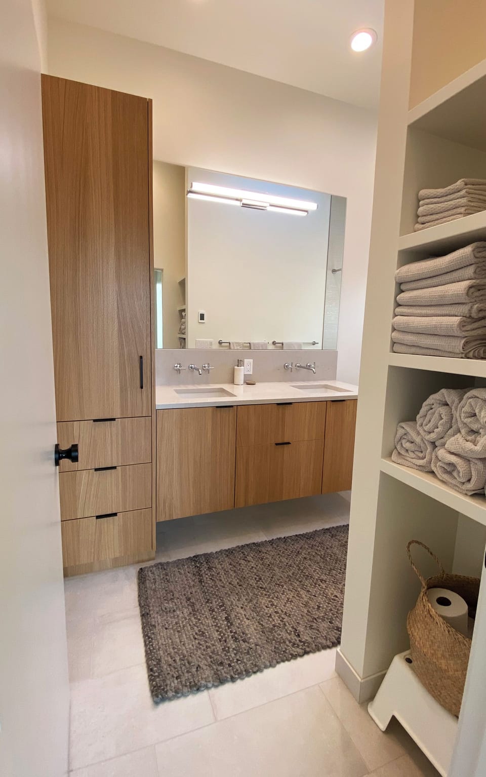 Dual vanities, lots of towels and plenty of storage for all your things!