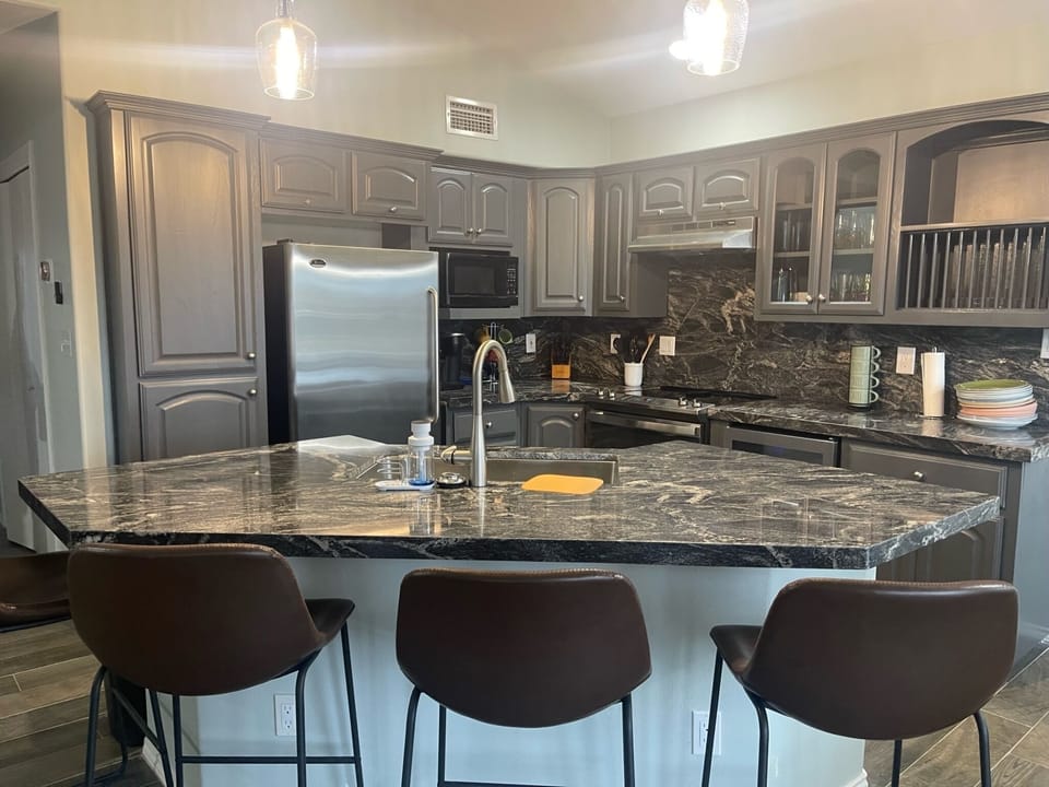 open kitchen, island counter top.