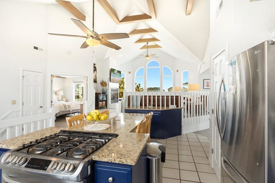 Enjoy additional prep and dining space at the Kitchen Island.