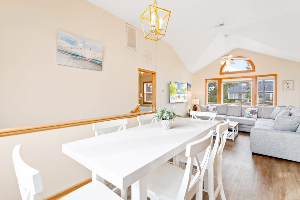 Enjoy additional seating at the breakfast bar and second dining table.