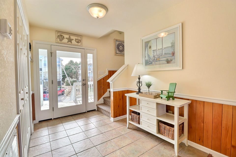 You'll find the main entry into the home on the middle level.