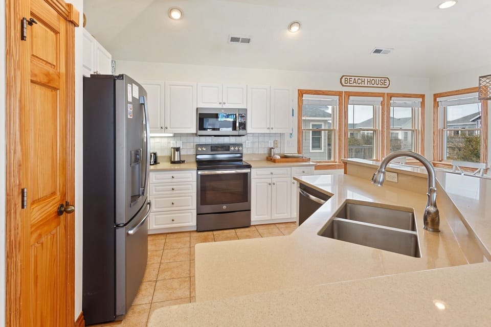 Whip up something delicious in the open-concept Kitchen for the whole family to enjoy.