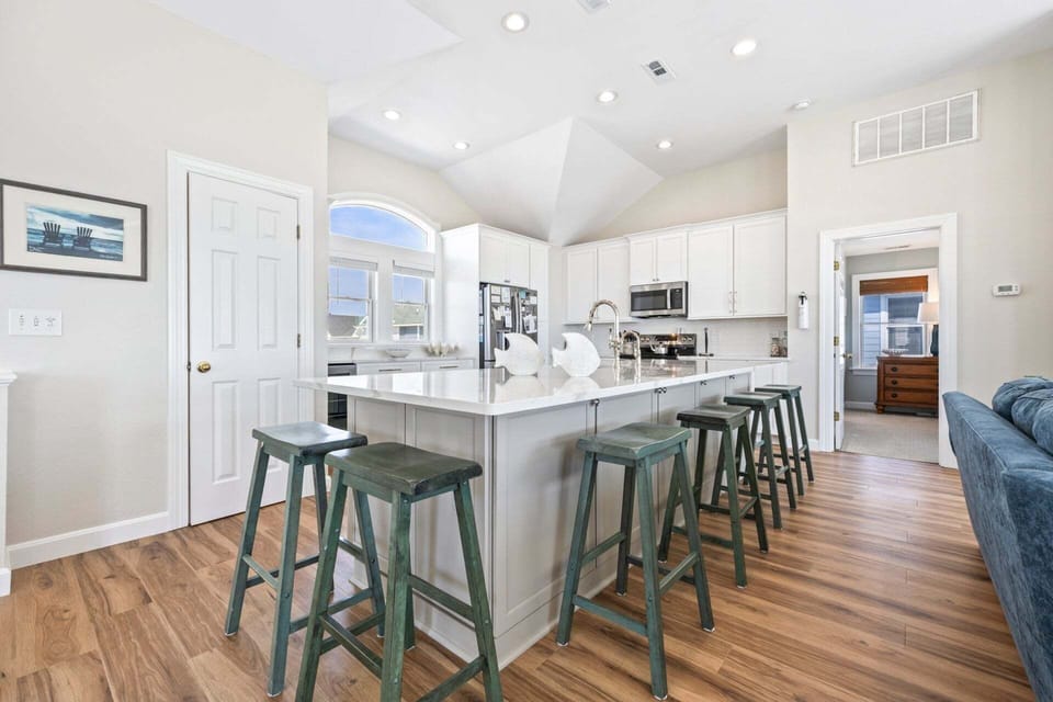 New For 2026: Full Kitchen Remodel with Custom Cabinets, Beverage/Wine Fridge & Entertaining Island!