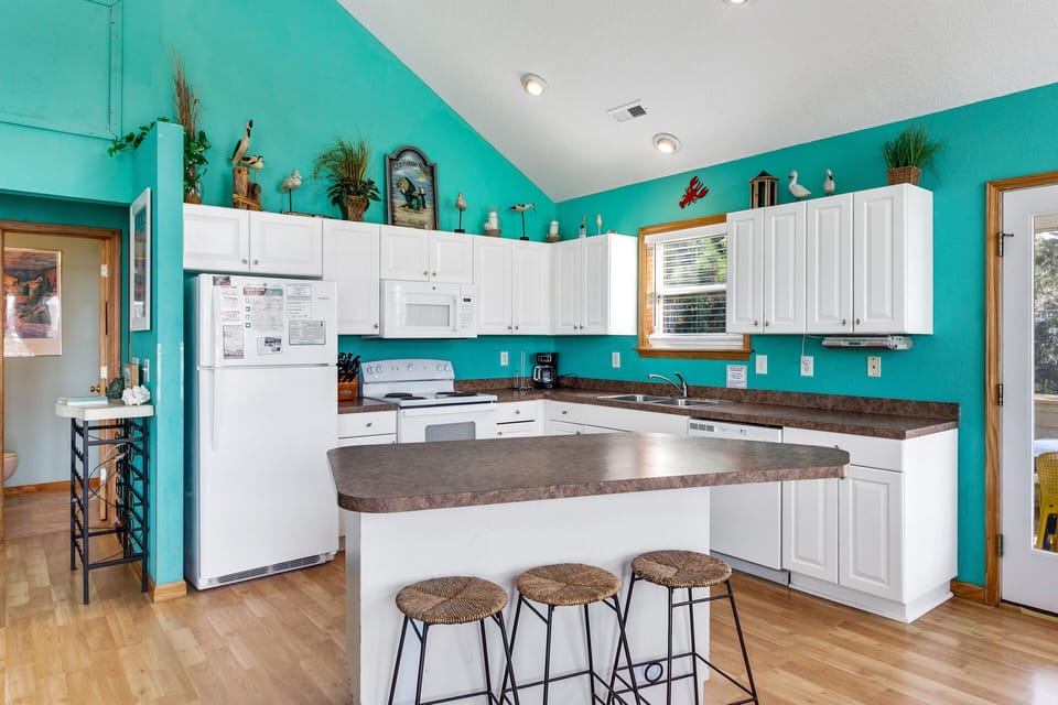The Kitchen with modern amenities is perfect for whipping up a delicious meal that the whole family will enjoy.