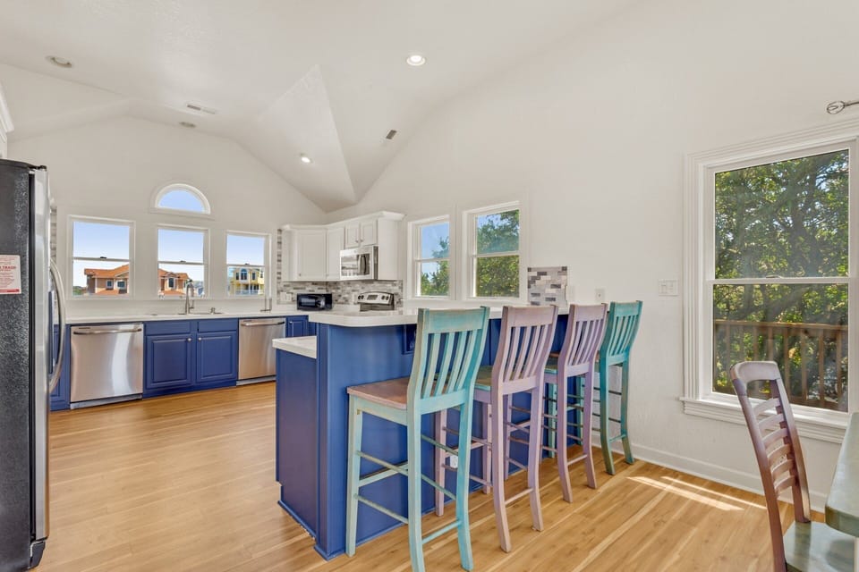 Whip up something delicious in the Kitchen with a Counter Bar on the Top Level.