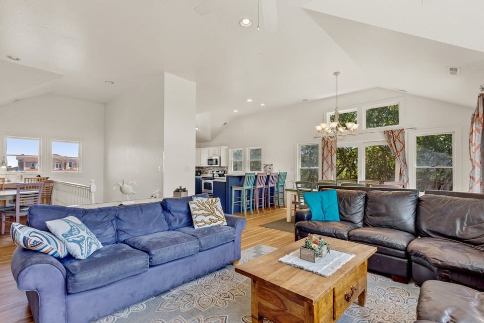 Relax in the Top-Level Living Area with a large Flat Screen TV and lots of natural light.