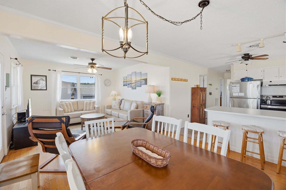 Eat together in the quaint Dining Area with natural light and beautiful decor.