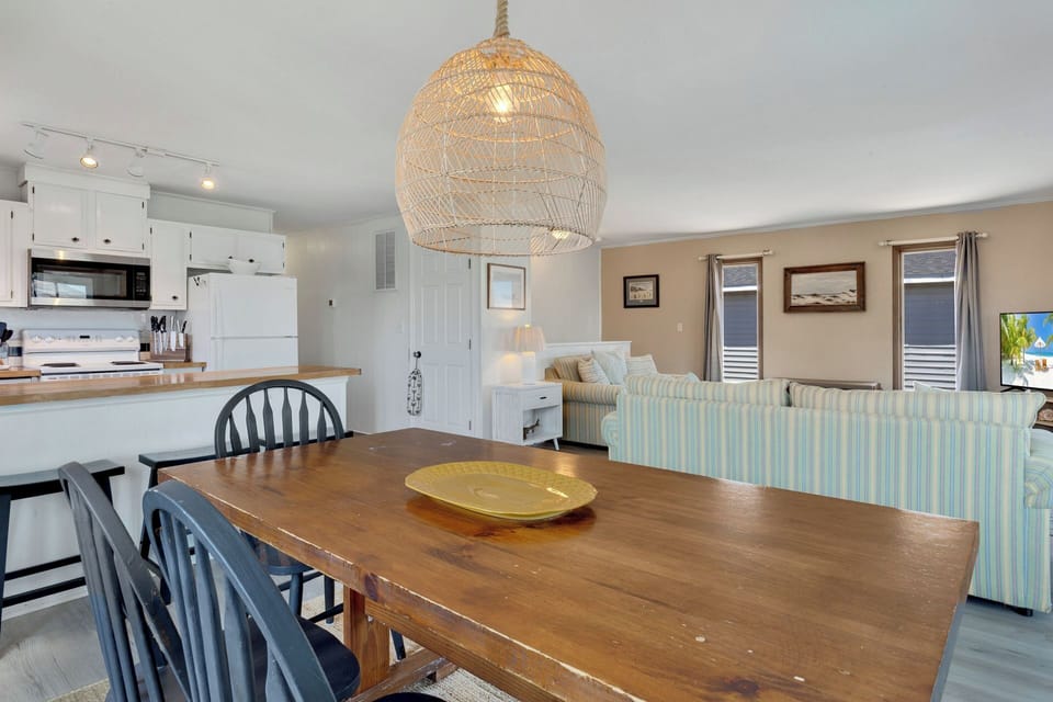 Enjoy a meal together in the brightly-lit Dining Area with seating for 6 where you can bask in the natural light from the nearby windows!