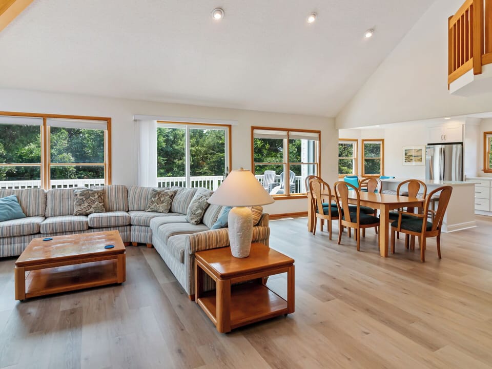 Effortlessly relax in the spacious Great Room with cathedral ceilings.