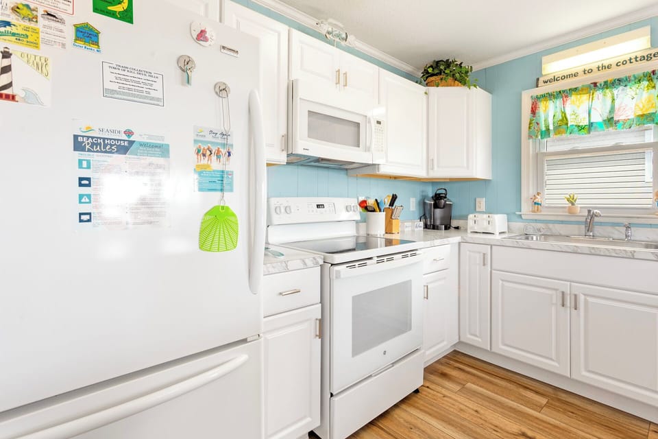 Kitchen: A fully stocked kitchen with a new stove (2022) makes meal prep a breeze.
