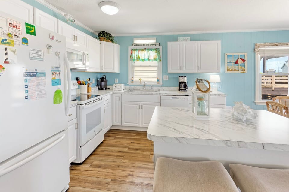 Kitchen: A fully stocked kitchen with a new stove (2022) makes meal prep a breeze.