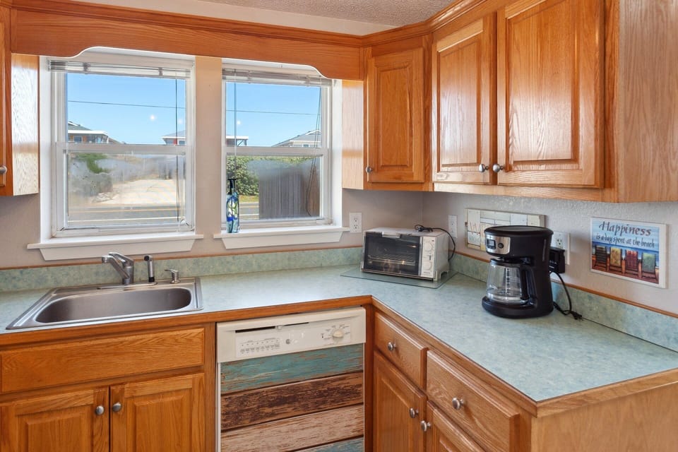 Make something delicious in the nearby open-concept Kitchen with modern appliances.
